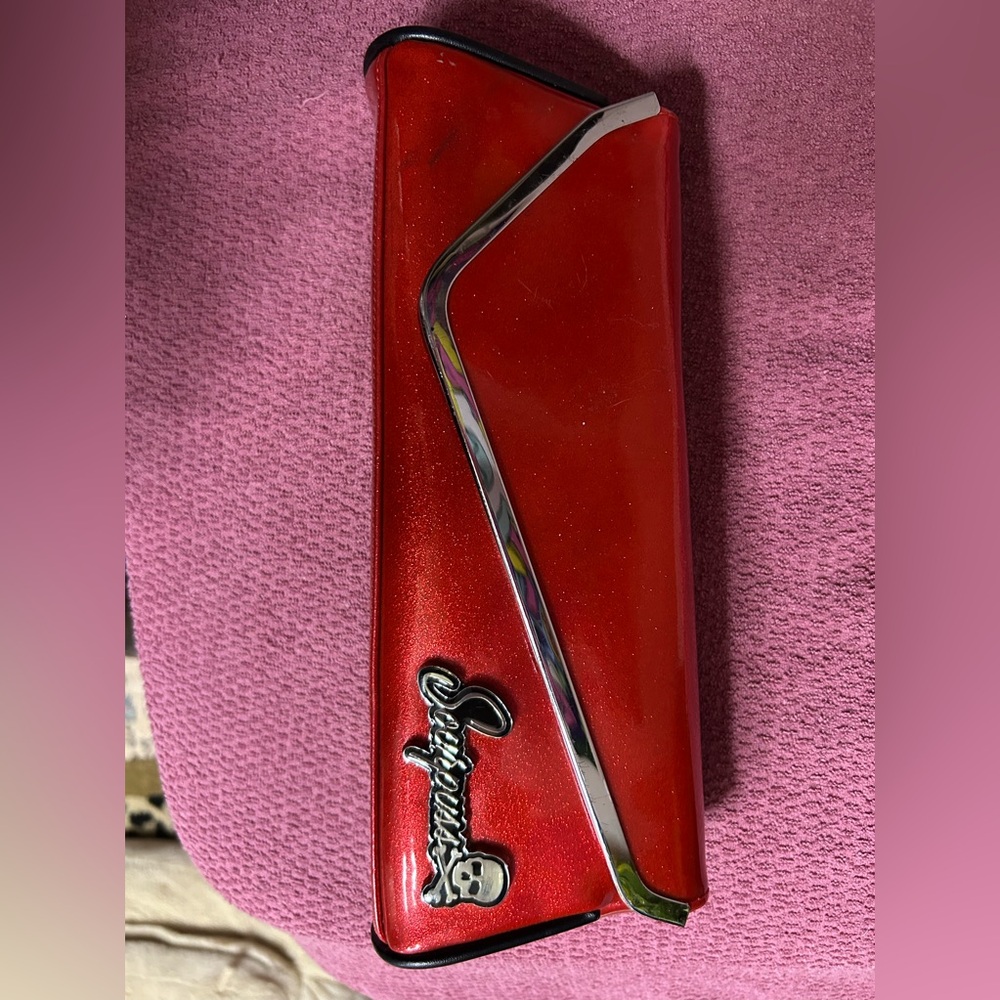 Sourpuss red clutch